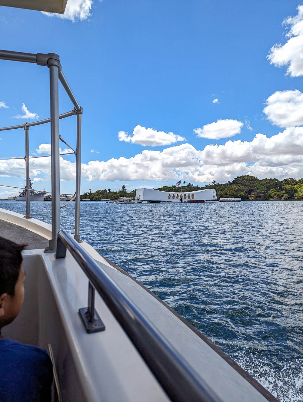 view of the uss arizona memorial from the boat