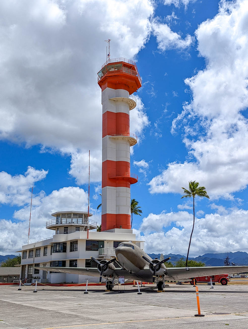 orange and white striped air control tower