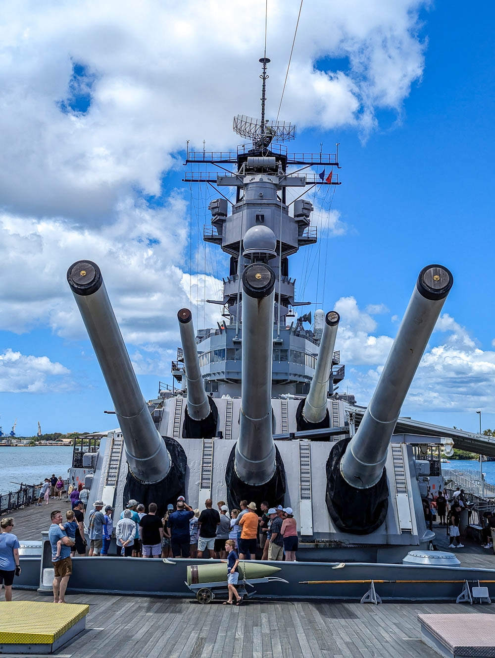 front view of a battleship under large guns