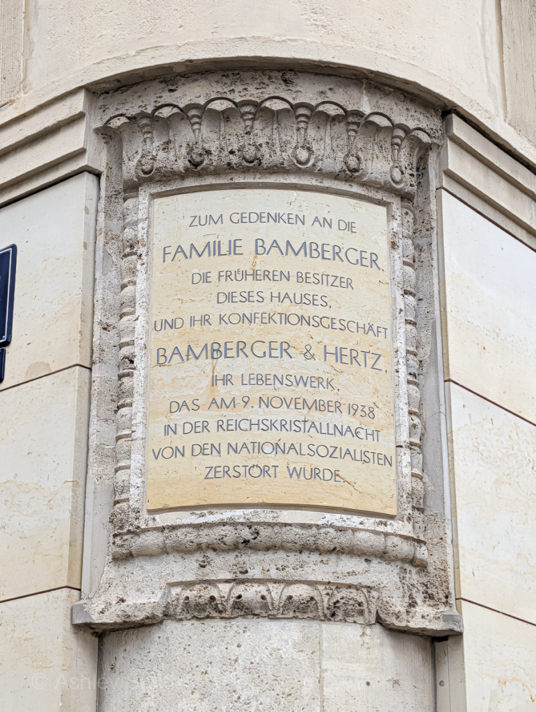 carved stone memorial on the building corner