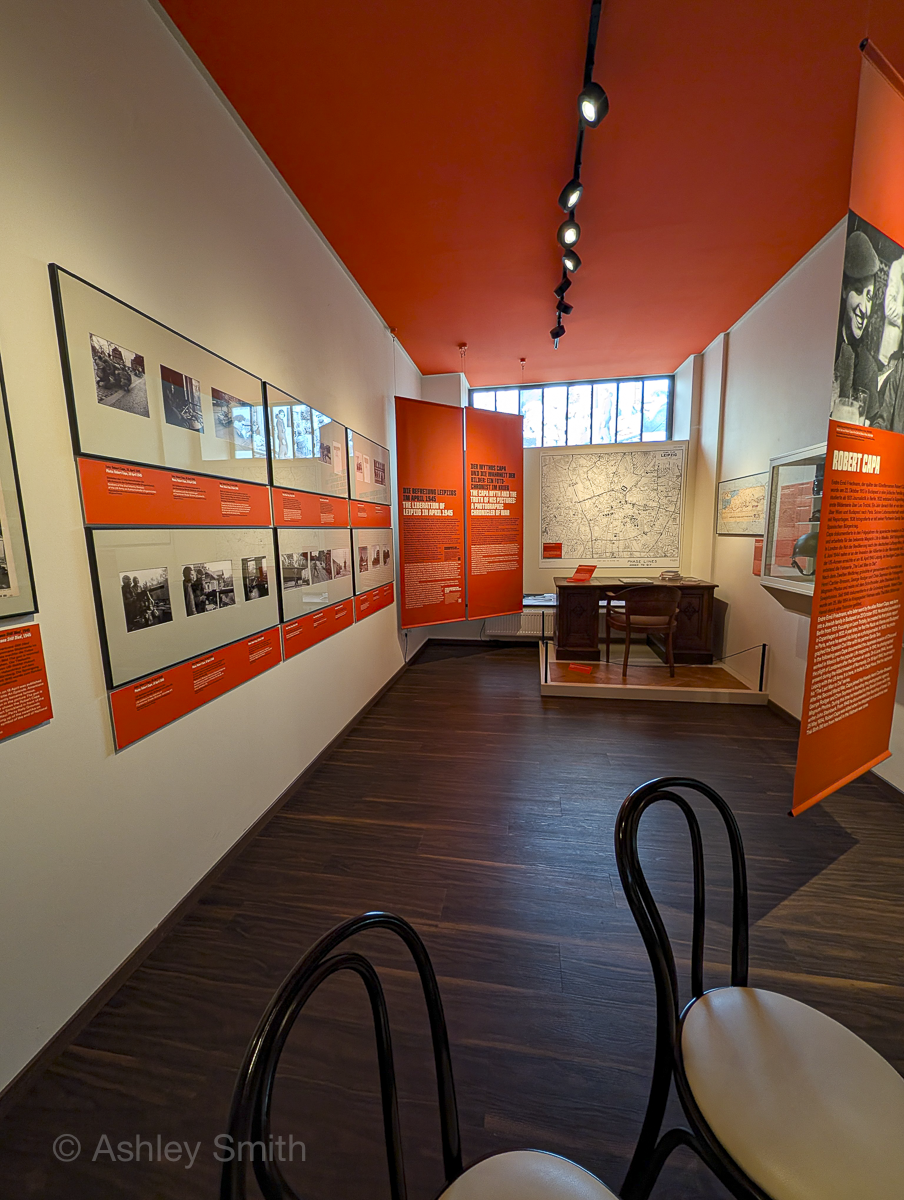 large red information banners inside a small room