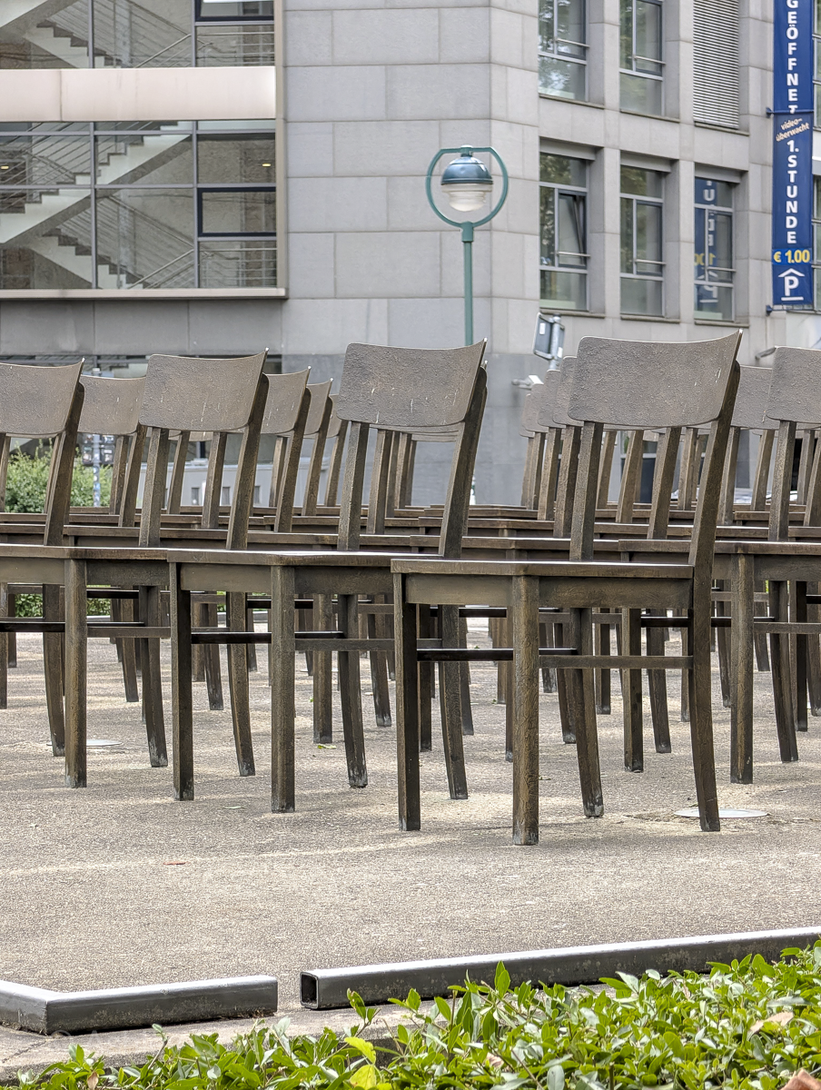 close up of brown empty chairs
